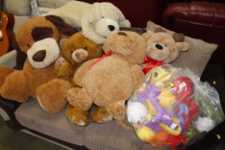 A collection of soft toys and teddy bears