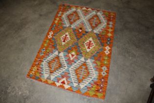 An approx. 4'2" x 2' 9" Chobi Kelim rug