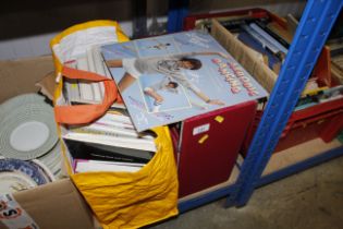 A case of records and bag of various books