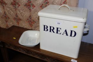 An enamel bread bin and a Jamie Oliver pie dish