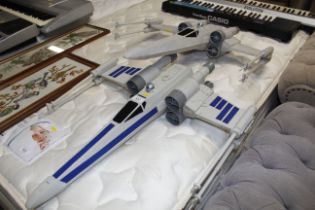 Two Hasbro models of Star Wars X-Wings