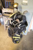 A quantity of golf clubs to include driver, three