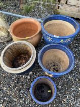 Three blue glazed plant pots and three similar