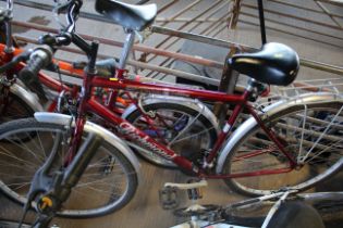 A Richmond Optima bicycle with front and rear mud guards, rear pannier rack with 3x6 speed gears