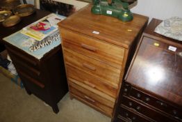 A mid 20th Century chest fitted four drawers