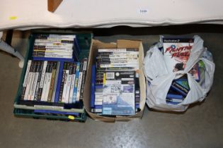 Two boxes and a bag of various console games to in