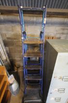 Two metal folding step ladders