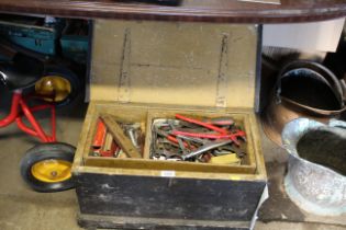 A wooden carpenters tool chest with internal tray