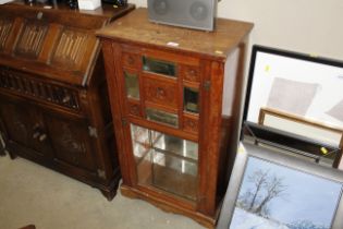 A late Victorian mirror fronted cabinet