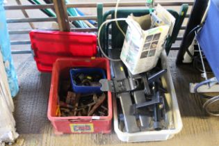 A box containing various hand tools, a metal framed folding chair, a Hozelock Pollyspray three spray