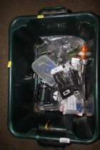 A box containing various fishing breakaway leads, hooks and a Daiwa Sealine 450h fishing reel etc