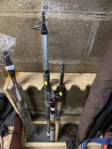 Three telescopic fishing rods