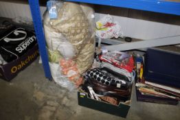 A bag of cushions and box containing bags, belts,