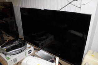 A Samsung LED television with remote control