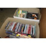 Two boxes of CDs