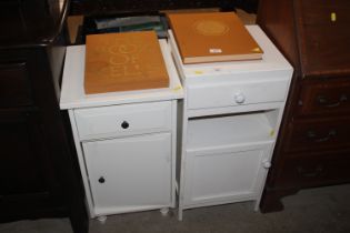 Two white painted bedside cupboards fitted single