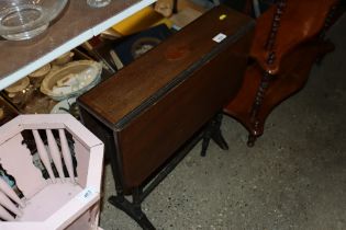 An Edwardian mahogany Sutherland table