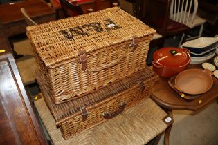 A Fortnum & Masons wicker basket; and one other wi