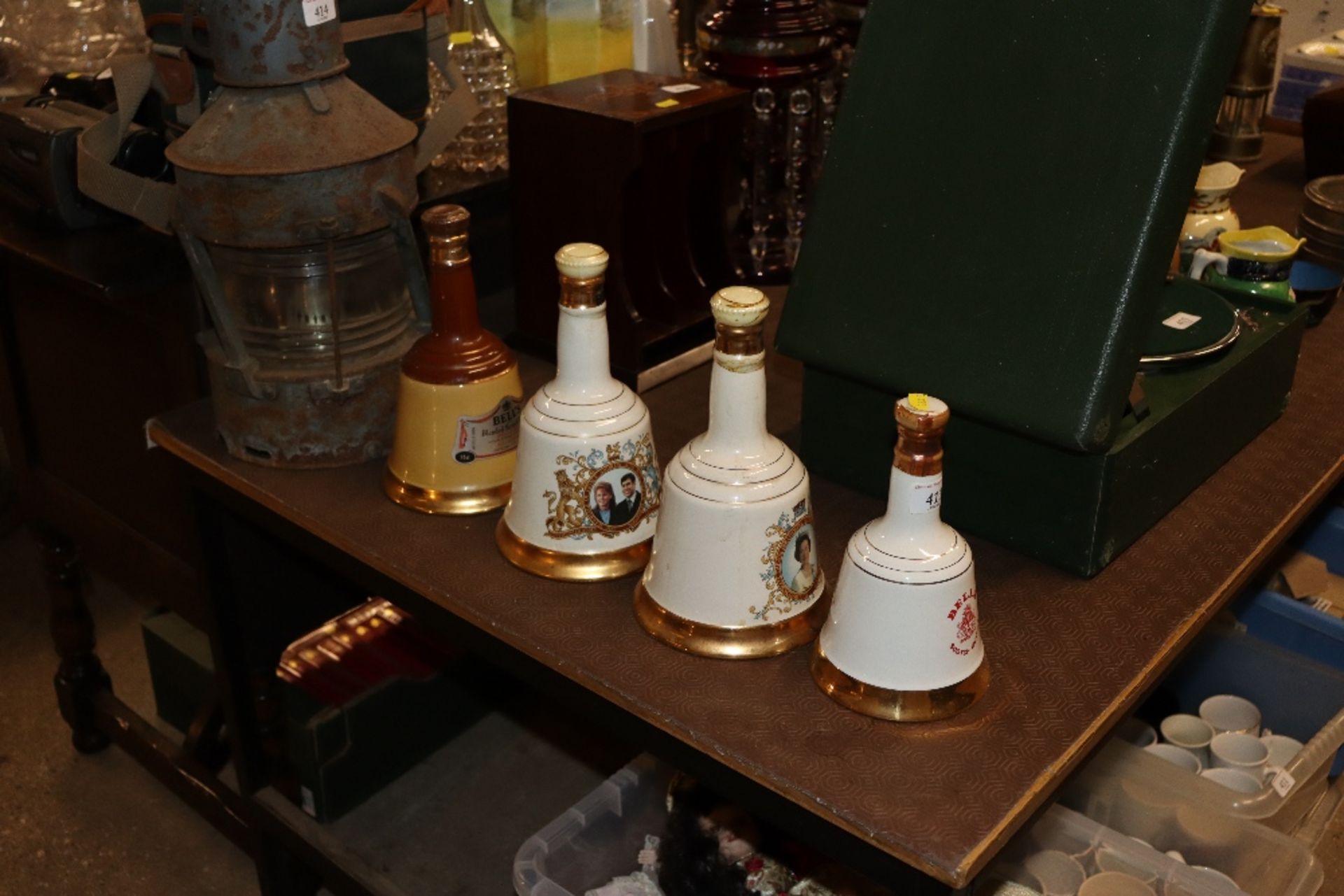 Four Wade Bells Scotch whisky decanters with conte