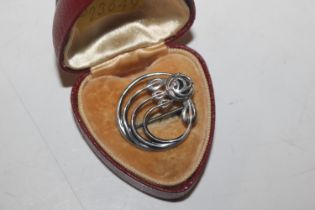 A Macintosh style Sterling silver brooch