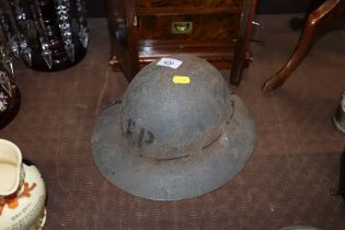 A 1940's tin helmet