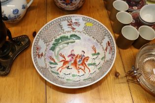 A Chinese porcelain bowl decorated with European s