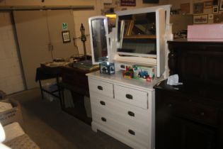 A white painted dressing chest fitted two short ov