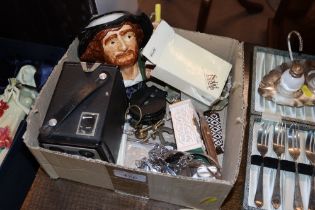 A box containing a box Brownie camera, character j