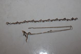 A Sterling silver dolphin bracelet and necklace