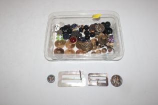 A box of assorted buttons; buckles and studs