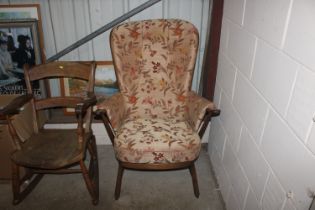 An Ercol stick back armchair