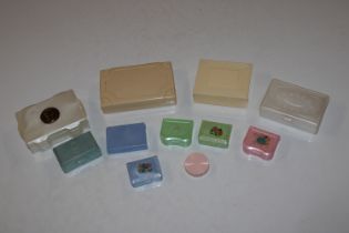 A box of vintage decorated plastic jewellery boxes