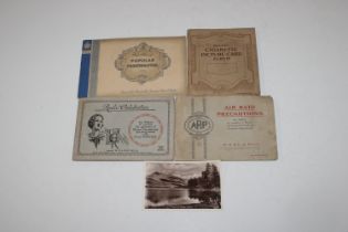 A box containing cigarette card albums