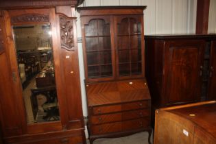 A 1920's glazed mahogany bureau bookcase