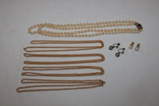 A double row pearl necklace with 9ct gold and seed