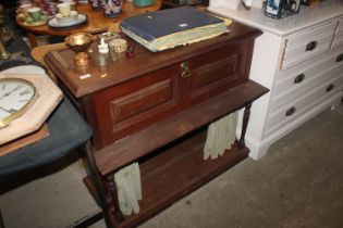 A late Victorian oak side cabinet with drop flap c