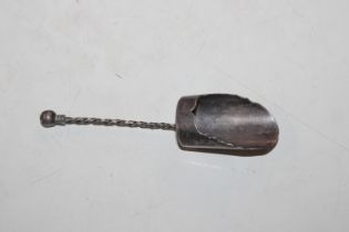 A silver sugar shovel with twist handle, London 19