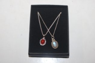 A Sterling silver fire opal pendant and chain and