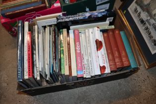 A box of various art related books