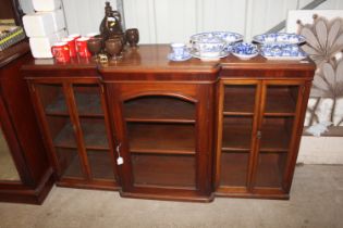 A 19th Century mahogany breakfront alcove cabinet