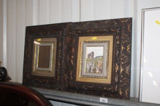 A pair of decorative gilt picture frames