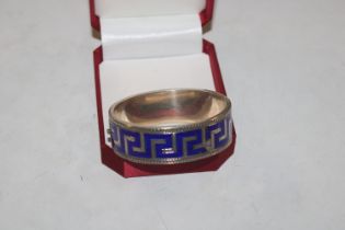 A vintage enamelled silver Greek Key bangle. appro