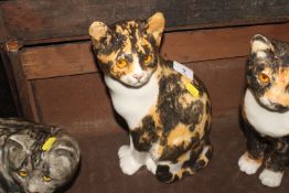 A Winstanley Pottery model of a cat with glass eye