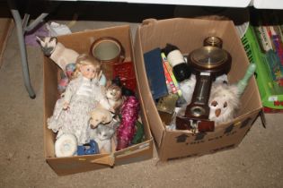 Two boxes containing cat and dog ornaments, collec