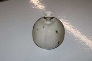 A Studio Pottery vase of peach shape with flared n