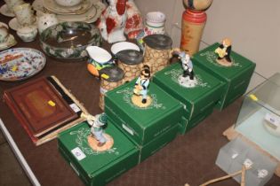 Seven boxed Beswick ornaments in the form of cat m