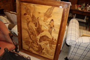 A large marquetry inlaid panel depicting Koi carp,