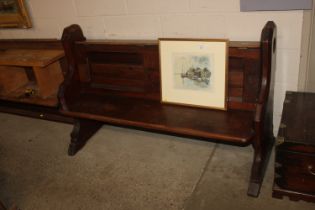 A pitch pine church pew