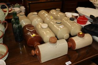 Ten stoneware hot water bottles and two vintage gr