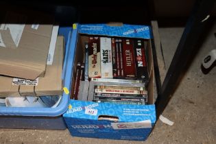 A box of various DVDs to include boxed sets